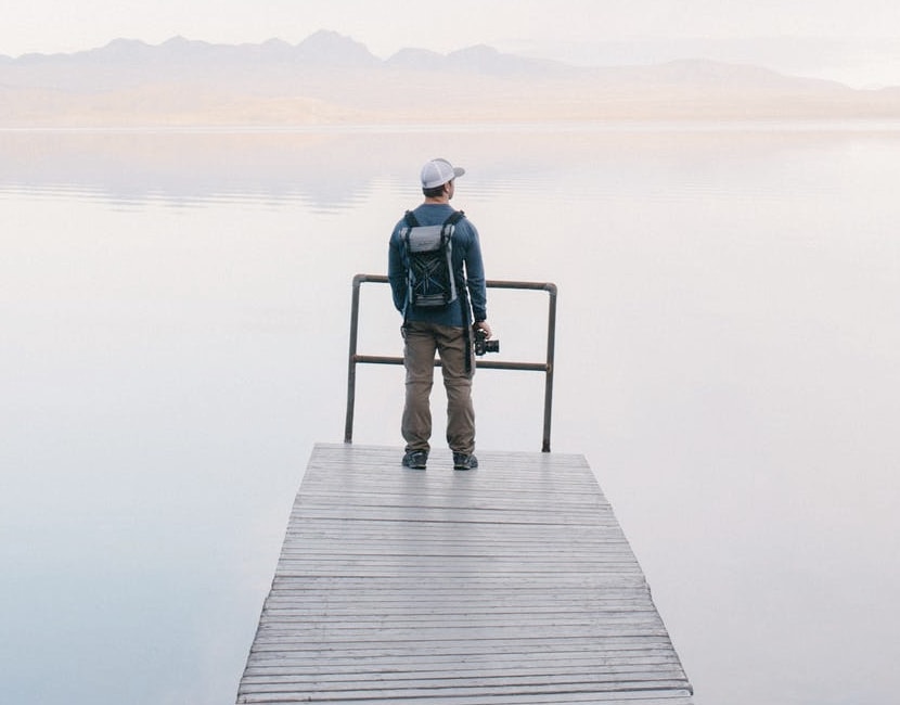 guy standing on a pier