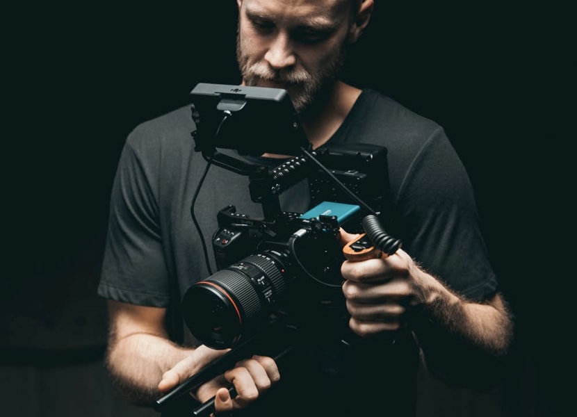 a man holding a camera